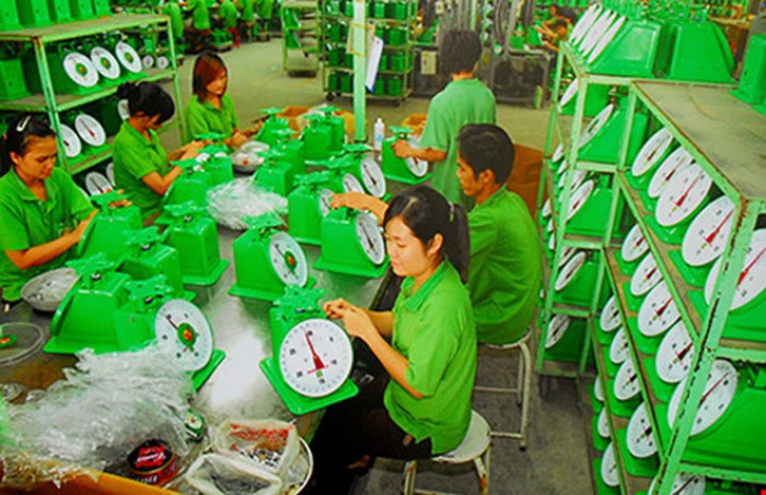 Cần giảm bớt gánh nặng thuế, phí để doanh nghiệp phát triển bền vững. Ảnh: Cao Thăng